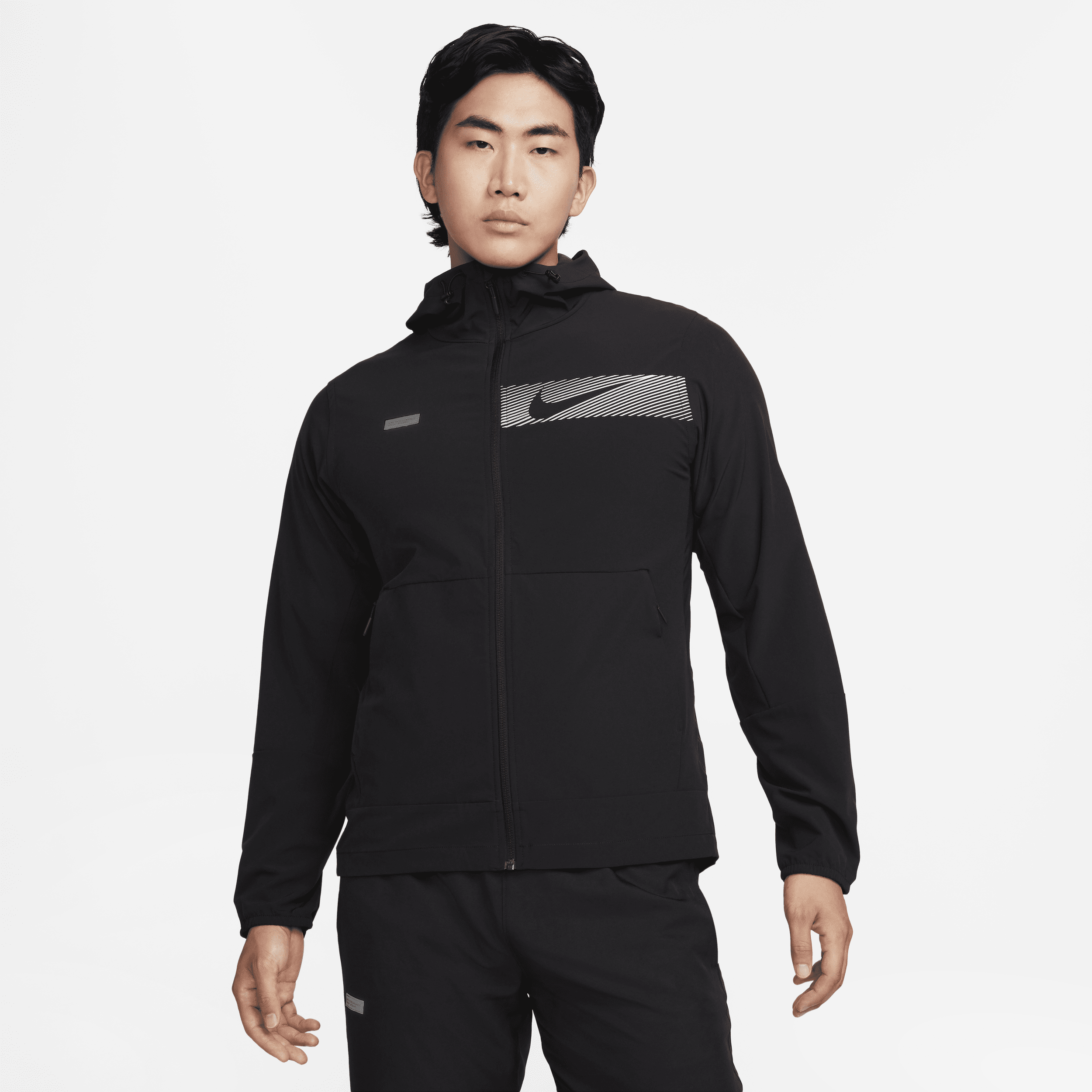 Alsidig Nike Unlimited Repel-jakke med hætte til mænd - sort