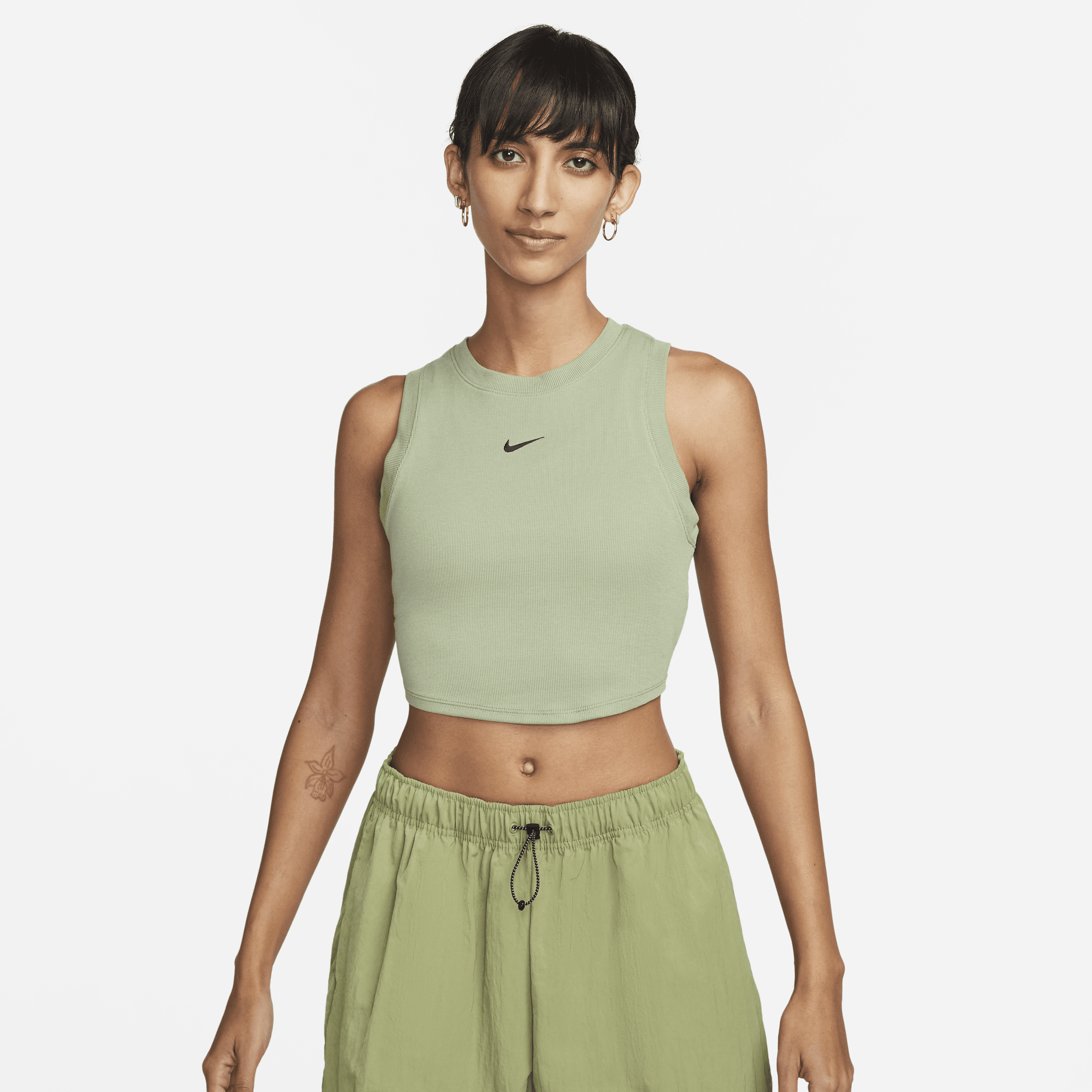 Stram, maskinstrikket Nike Sportswear Chill-mini-tanktop med kort snit til kvinder - grøn