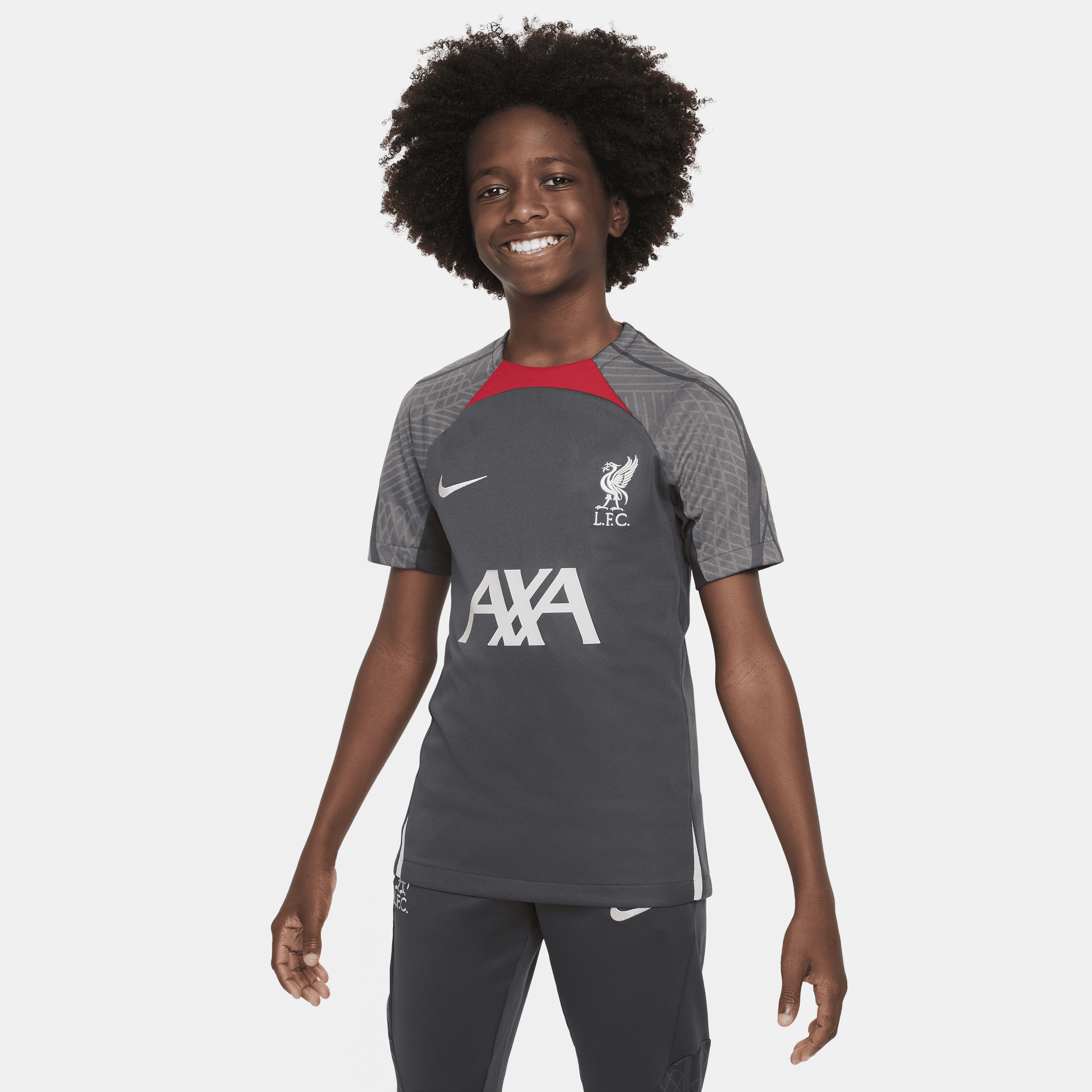 Maskinstrikket Liverpool FC Strike Nike Dri-FIT-fodboldtrøje til større børn - grå