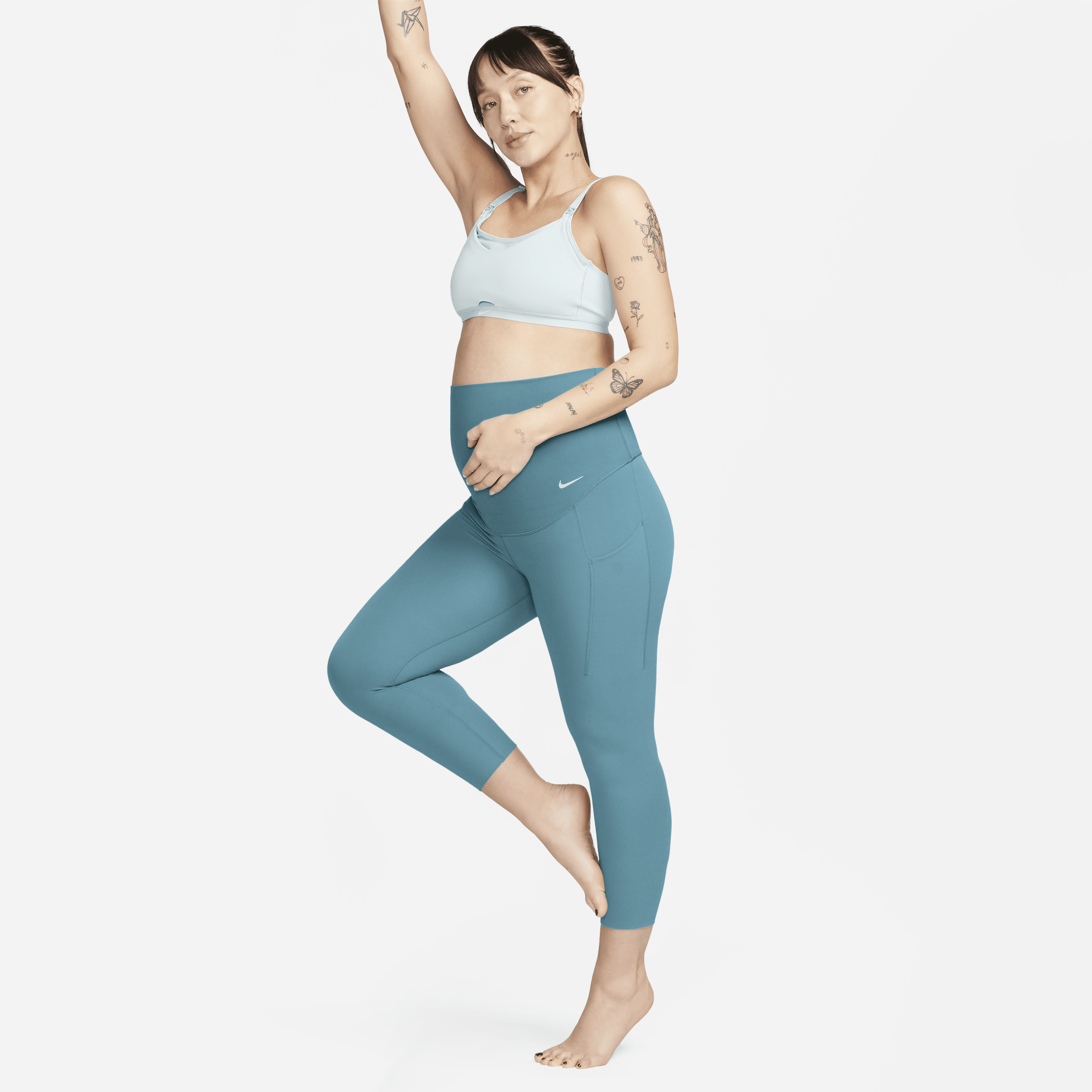 Nike Zenvy (M) 7/8-legging met iets ondersteunende hoge taille en zakken voor dames (zwangerschapskleding) - Blauw