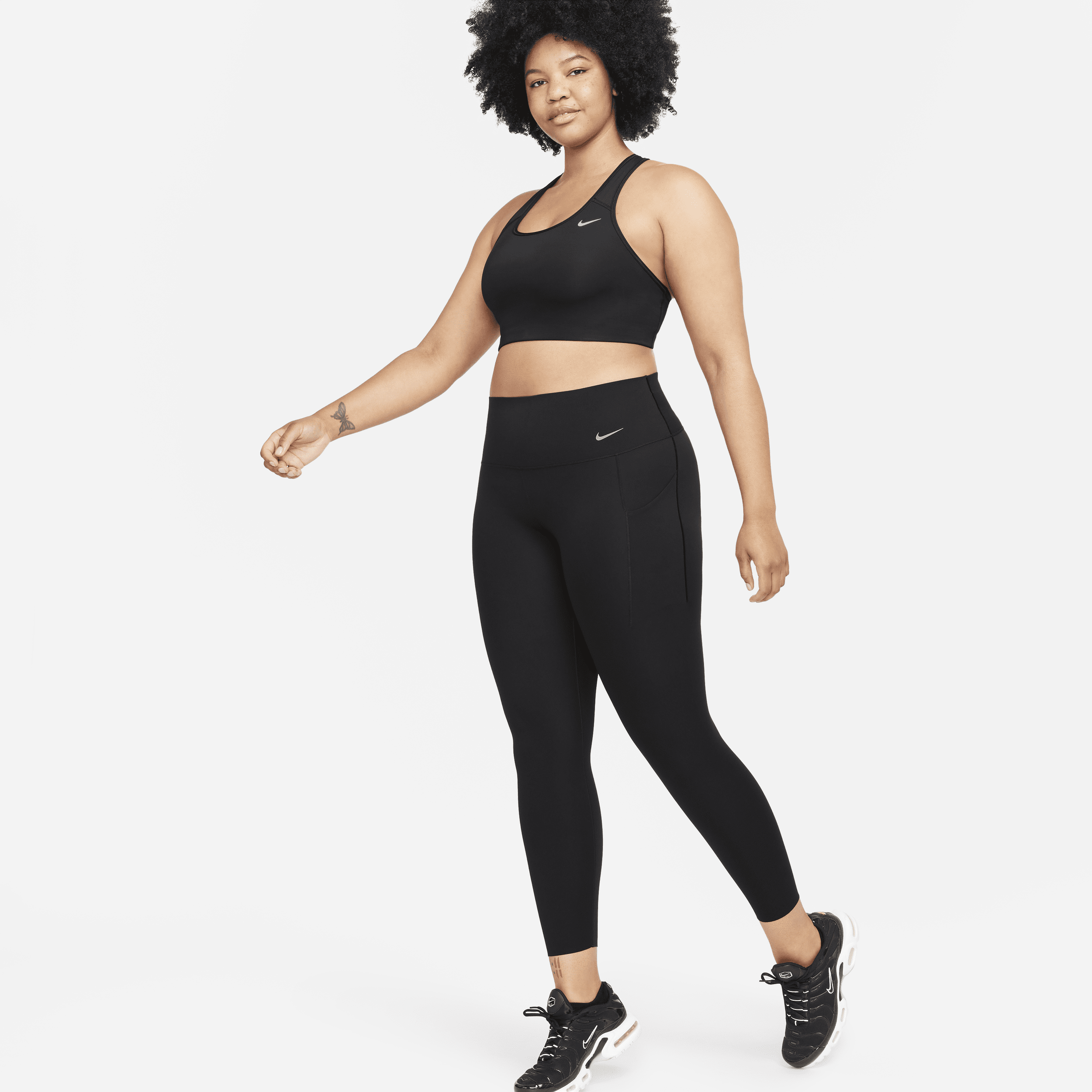 Nike Universa-leggings i 7/8 længde med medium støtte, høj talje og lommer til kvinder - sort