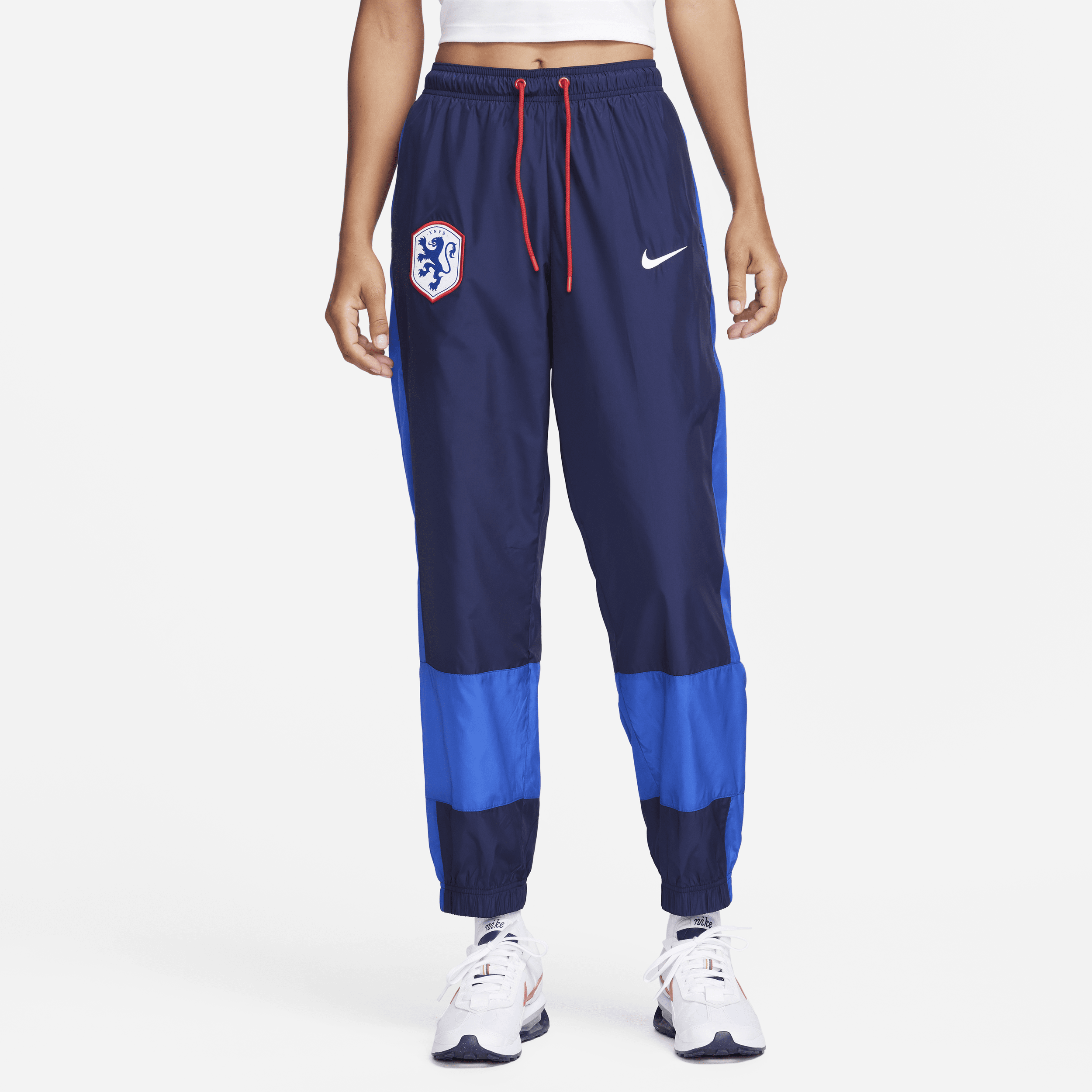 Holland Repel Essential-joggers Nike med mellemhøj talje til kvinder - blå