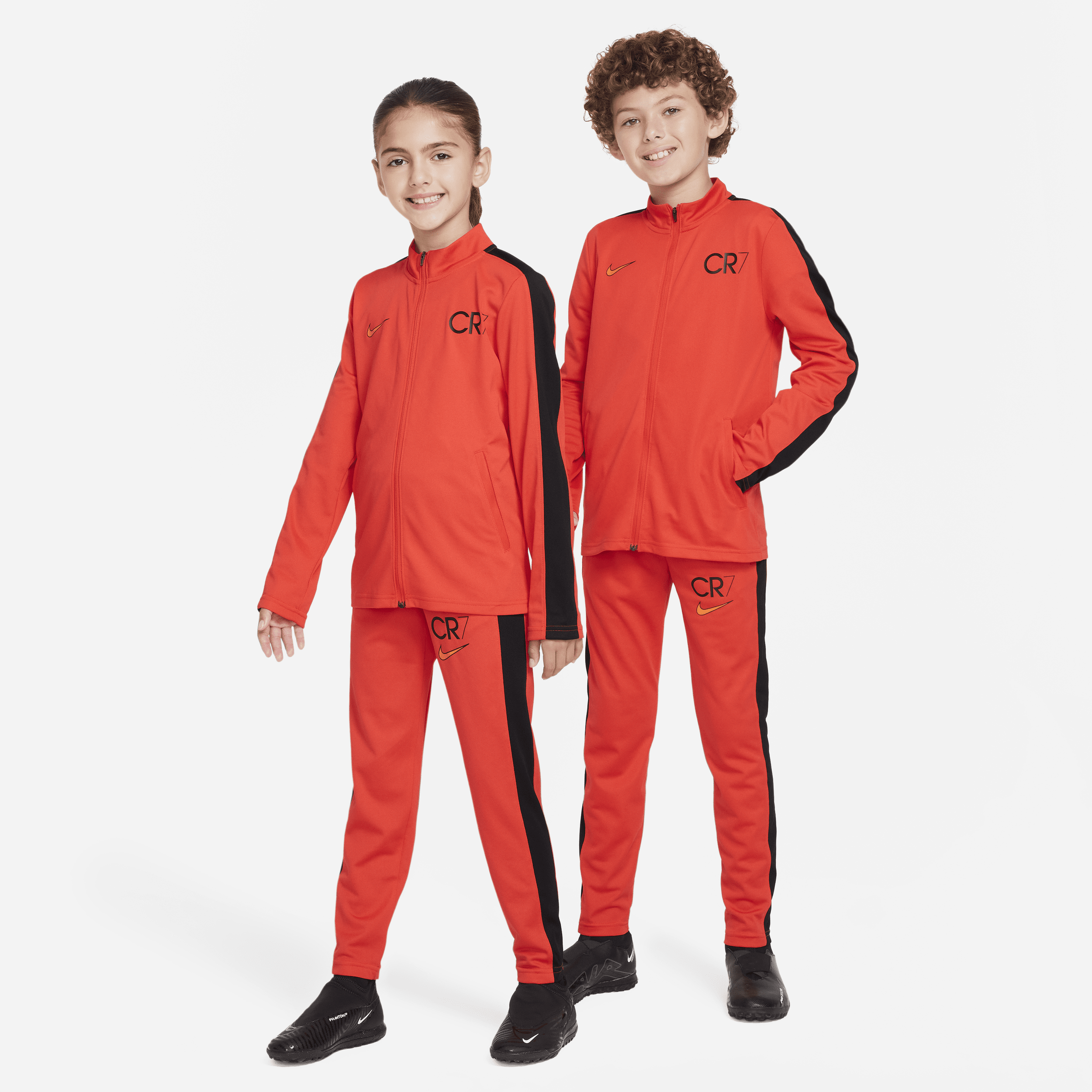 Nike CR7 Dri-FIT Academy23-fodboldtræningsdragt til større børn - rød