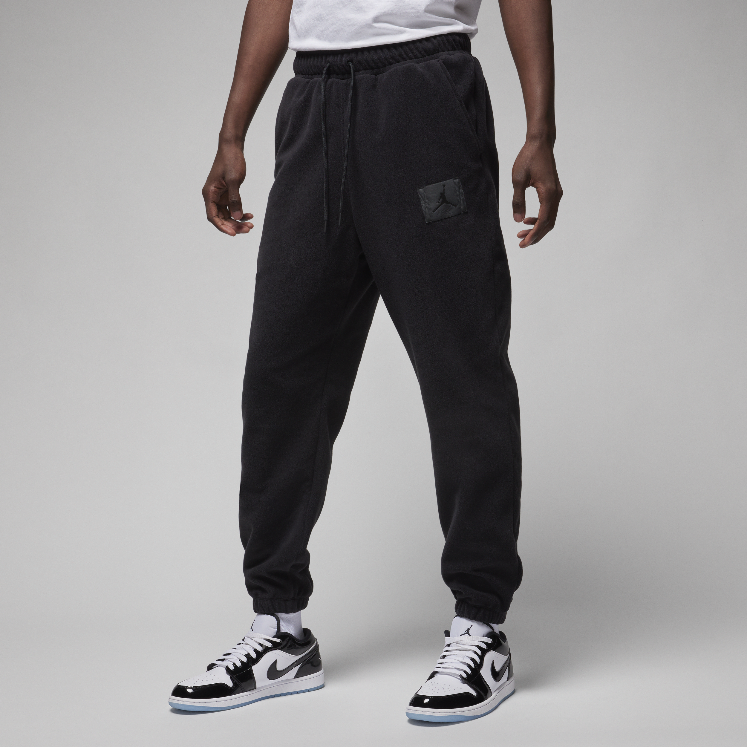 Jordan Essentials Pantalón de fútbol de tejido Fleece de invierno - Hombre - Negro