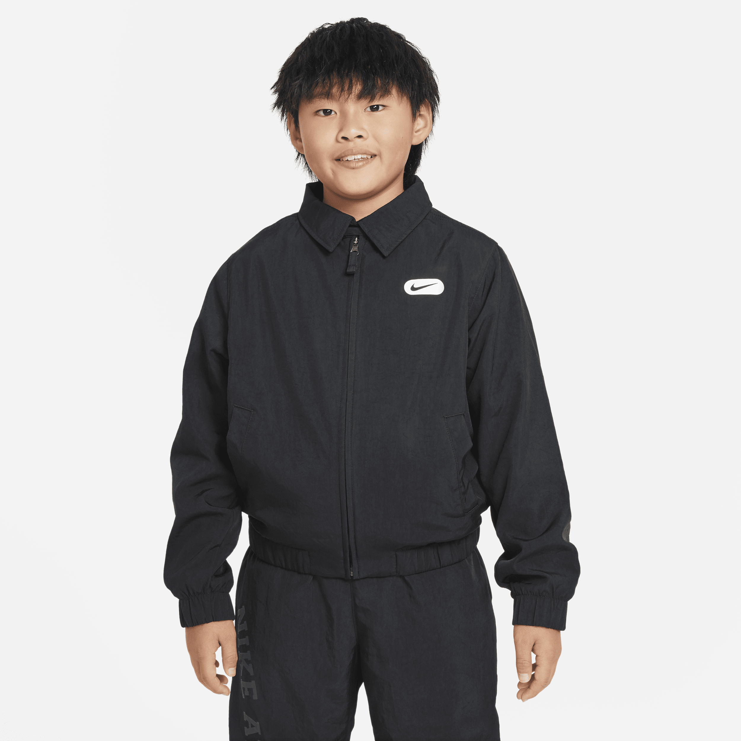Nike Repel Athletics-jakke til større børn (drenge) - sort