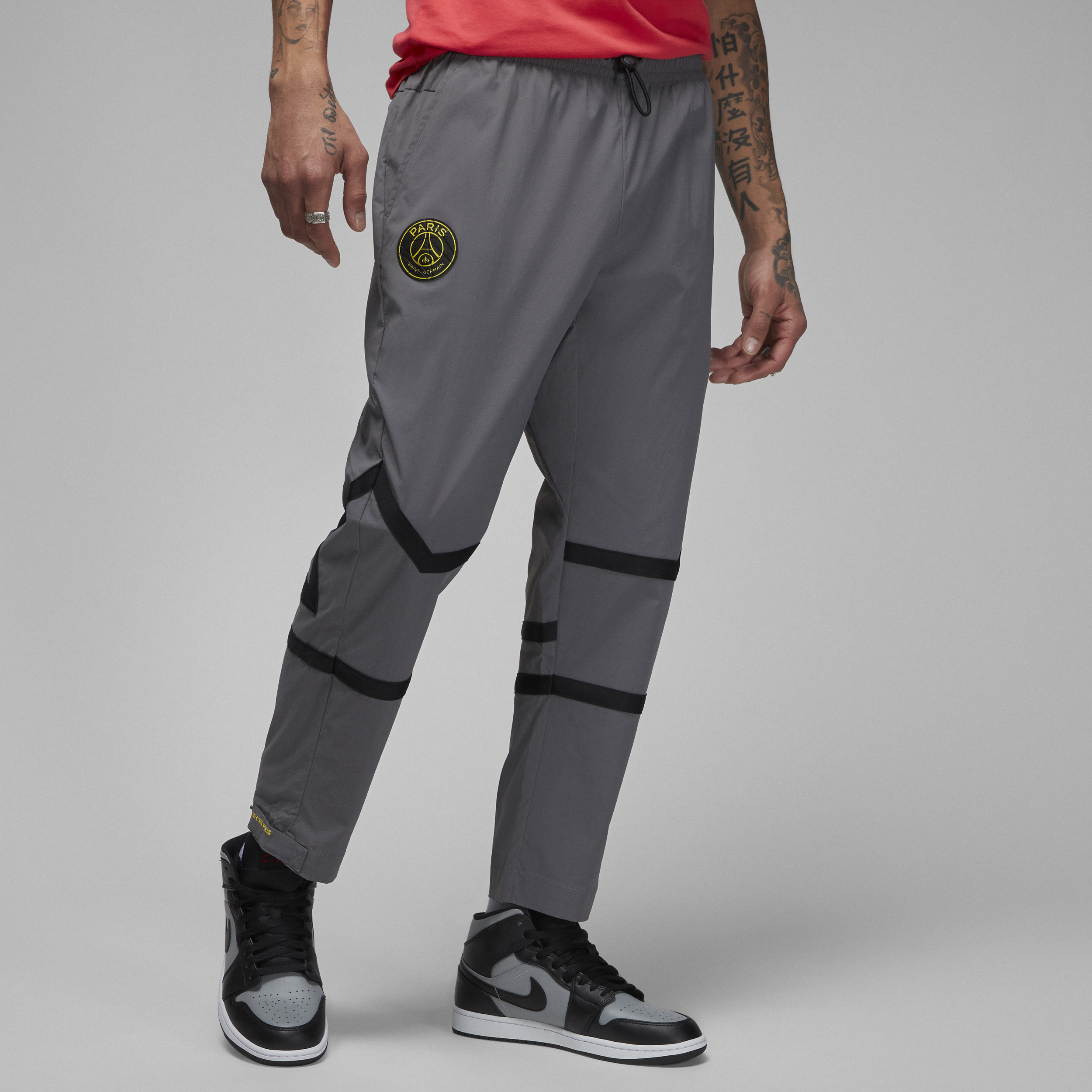 Nike Pantaloni in tessuto Paris Saint-Germain - Uomo - Grigio