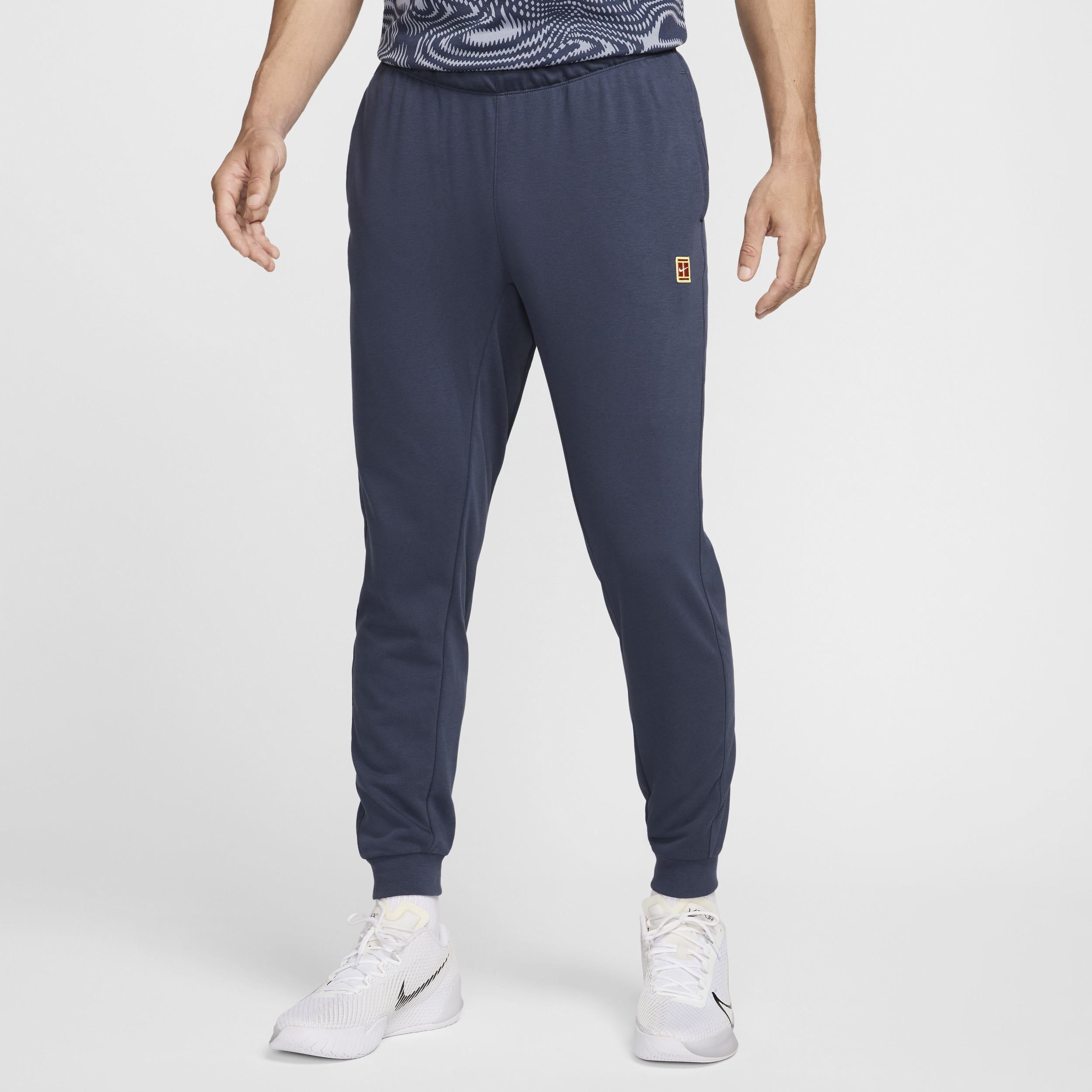 Pantaloni da tennis in French Terry NikeCourt Heritage – Uomo - Blu