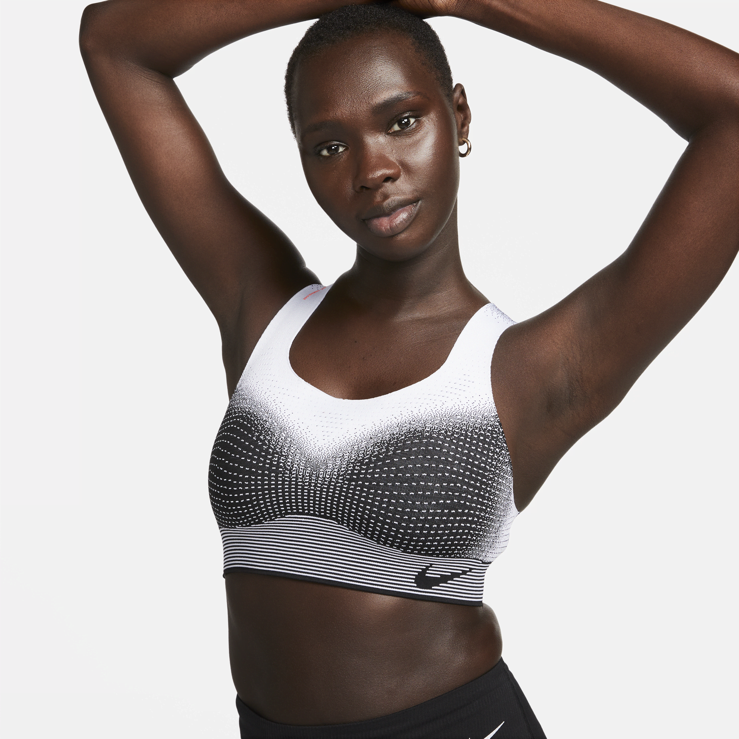 Nike Swoosh Flyknit-sports-bh uden indlæg og med højt støtteniveau til kvinder - sort