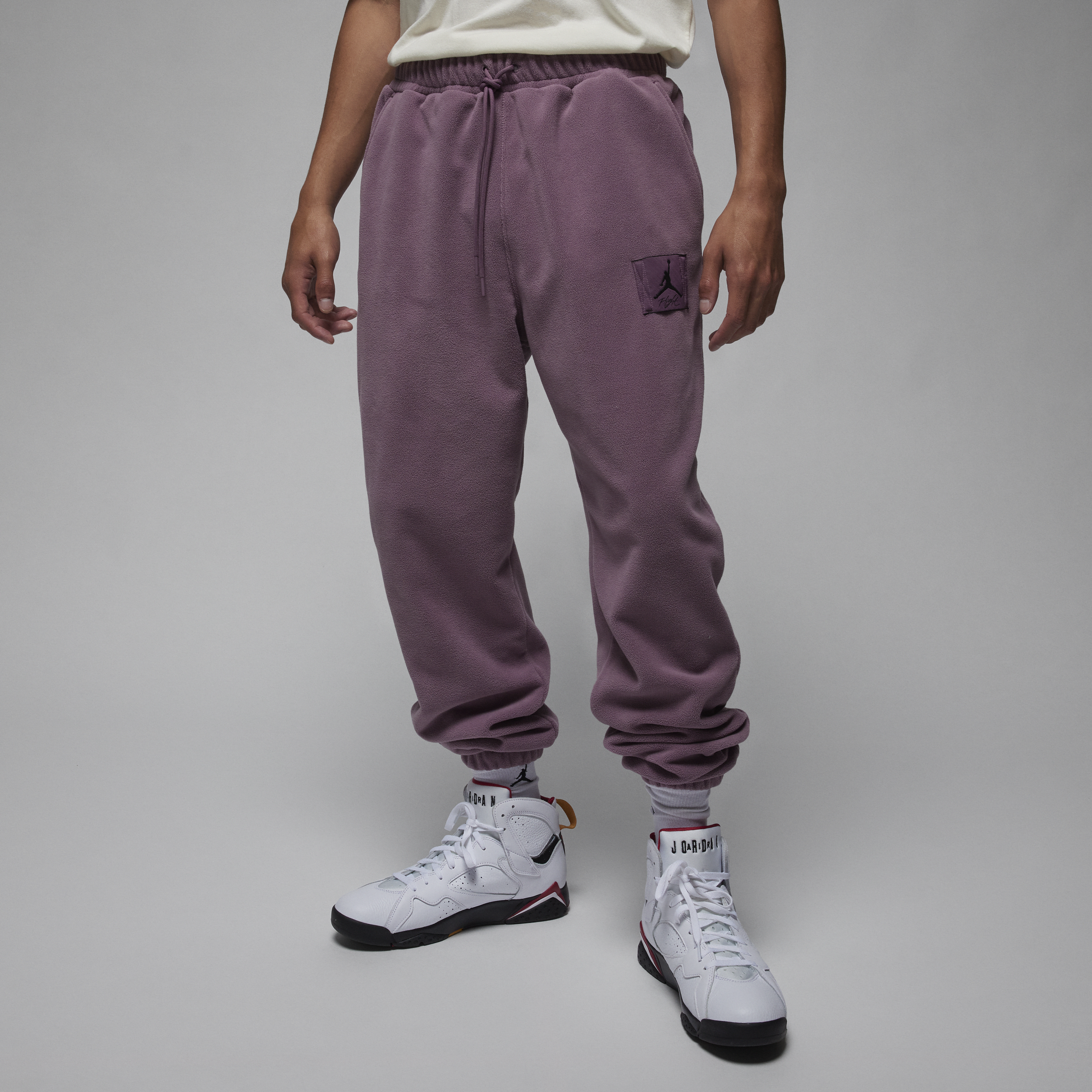 Jordan Essentials Pantalón de fútbol de tejido Fleece de invierno - Hombre - Morado