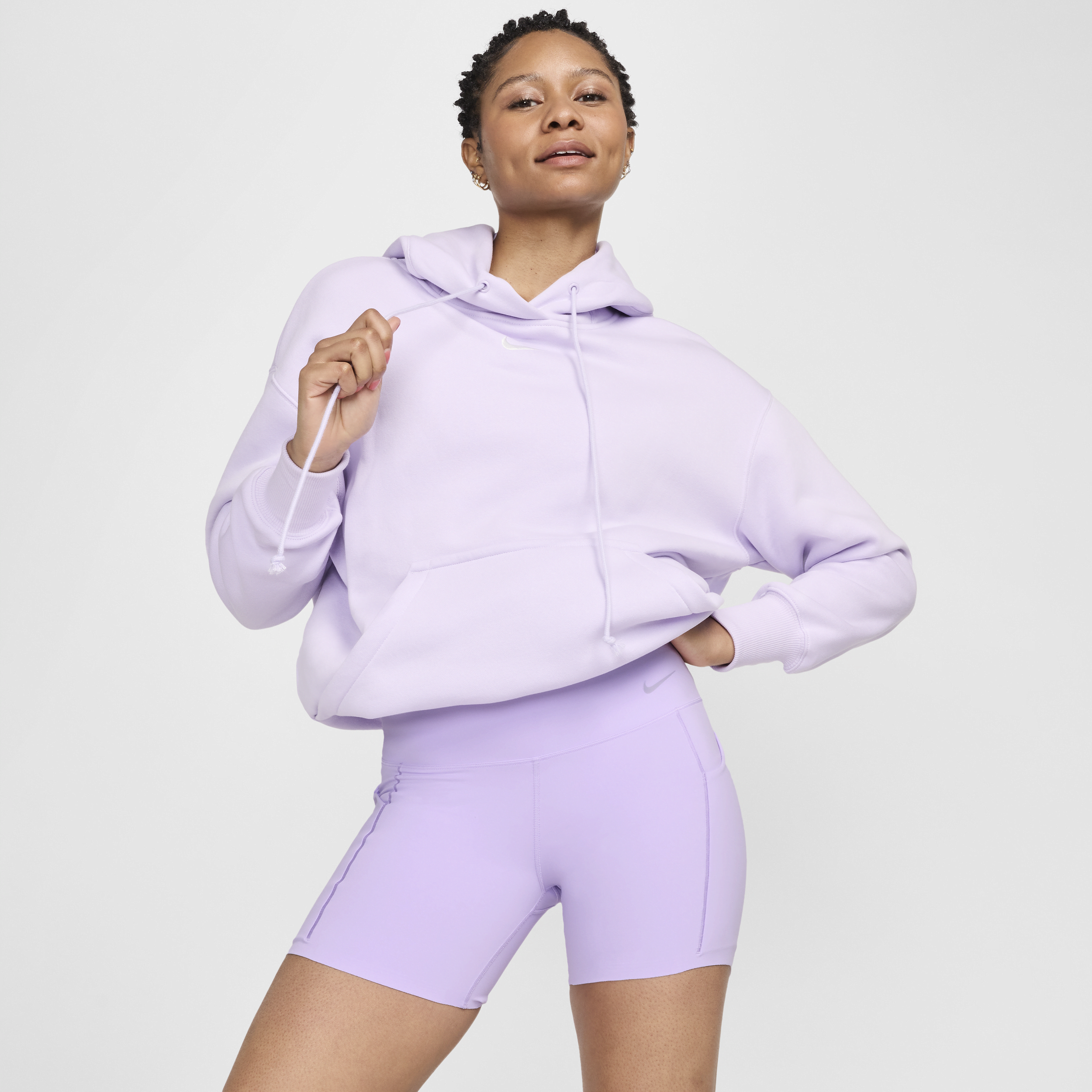 Nike Universa Mallas cortas de talle alto y sujeción media de 20 cm con bolsillos - Mujer - Morado