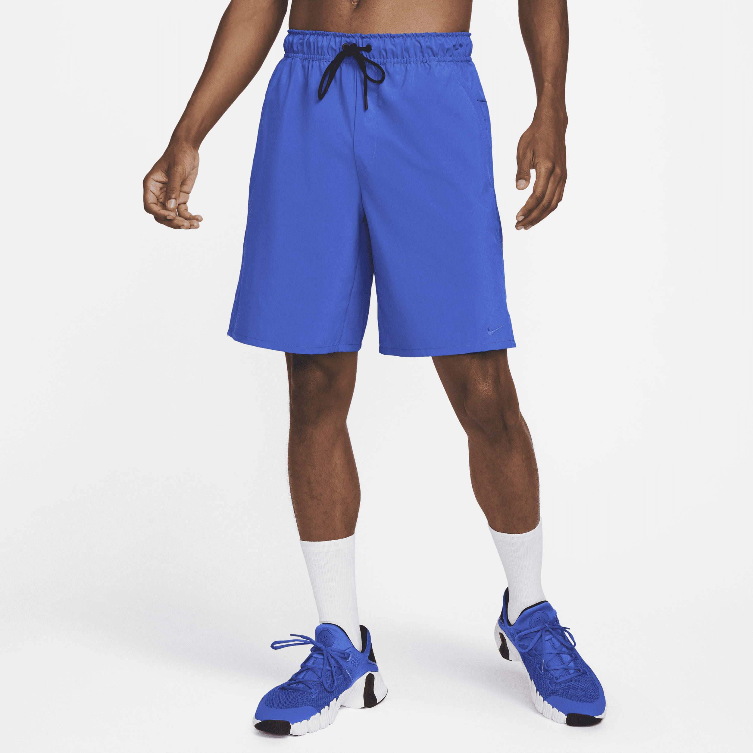 Nike Unlimited multifunctionele niet-gevoerde herenshorts met Dri-FIT (23 cm) - Blauw