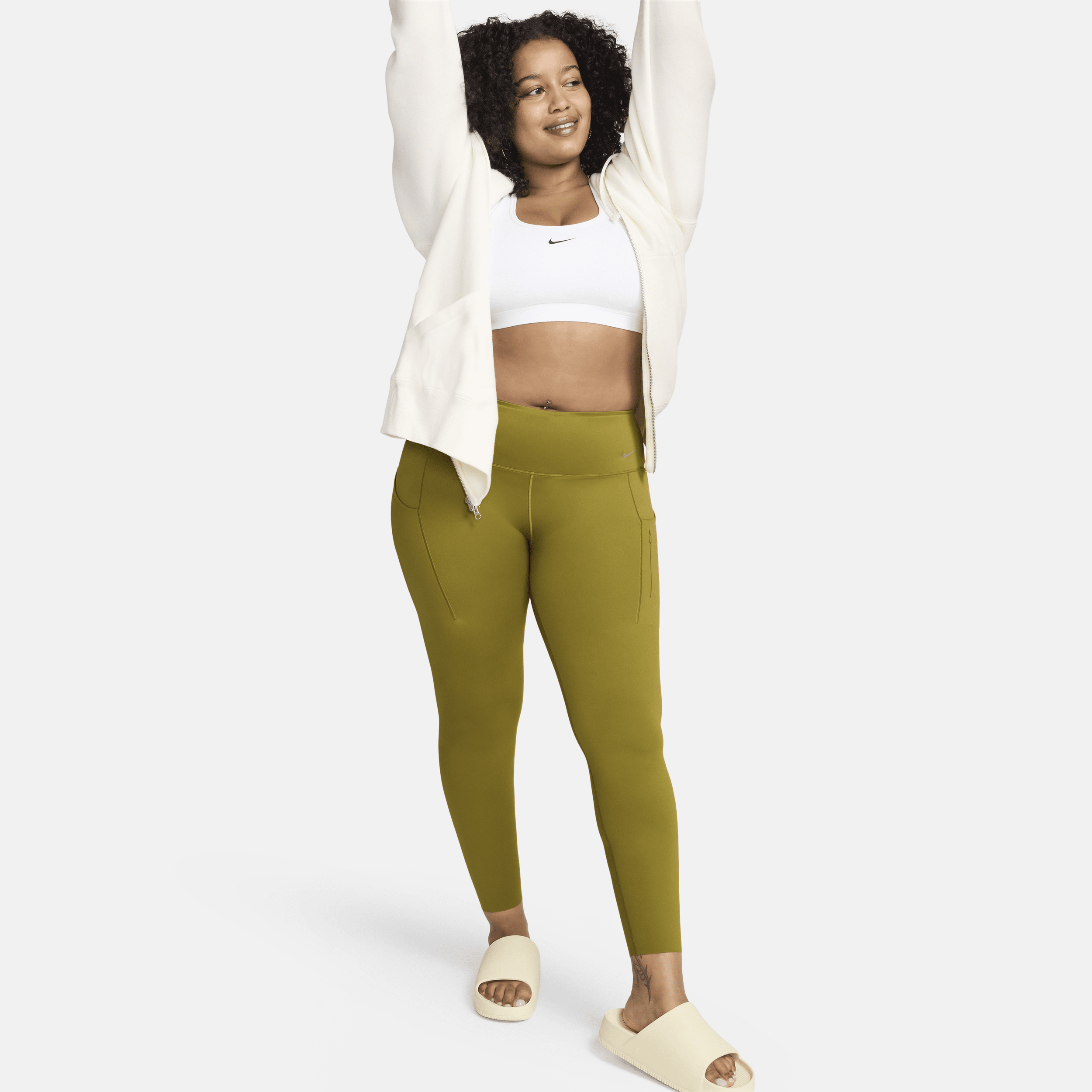Nike Go-7/8-leggings med højt støtteniveau, mellemhøj talje og lommer til kvinder - grøn