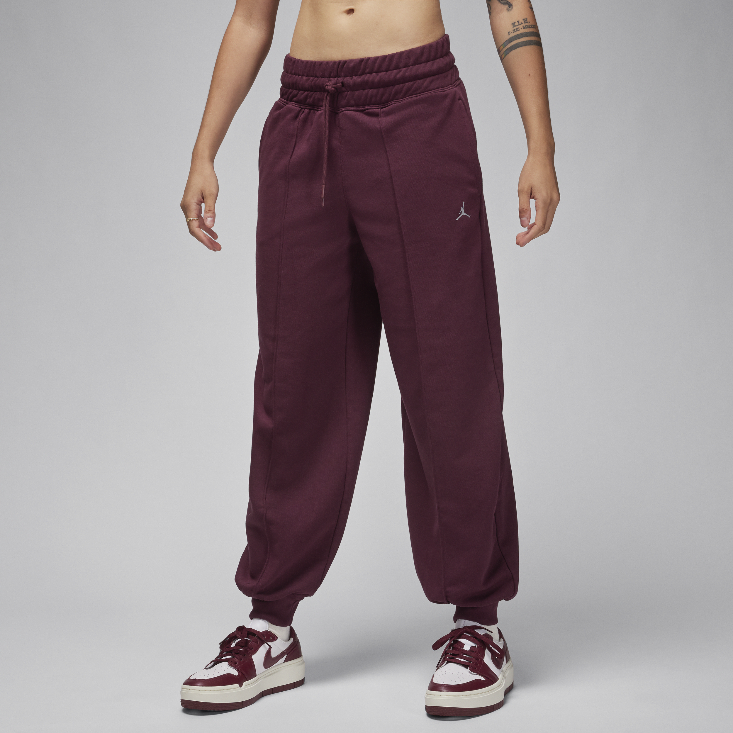 Nike Pantaloni in fleece con grafica Jordan Sport – Donna - Rosso