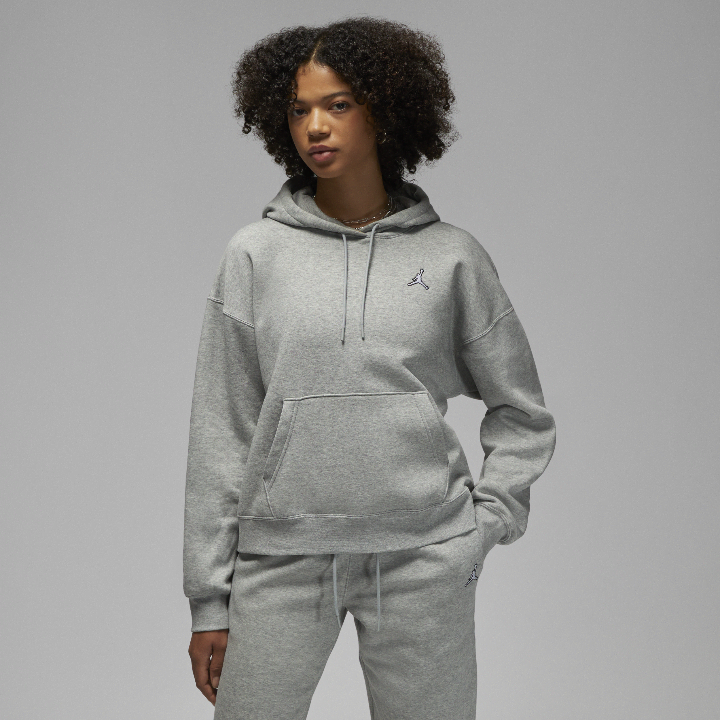Nike Felpa pullover in fleece con cappuccio Jordan Brooklyn – Donna - Grigio