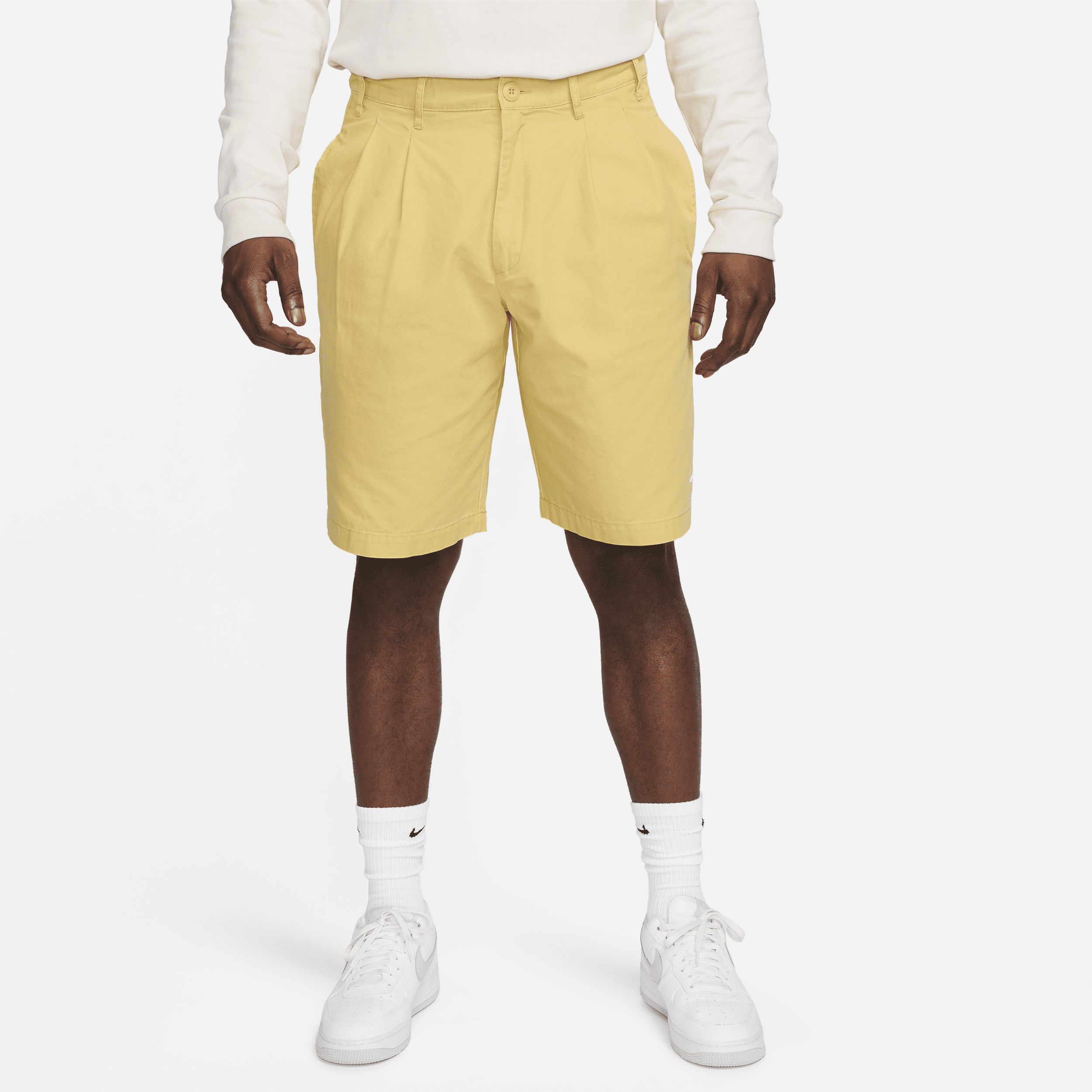 Plisserede Nike Life-chinoshorts til mænd - gul