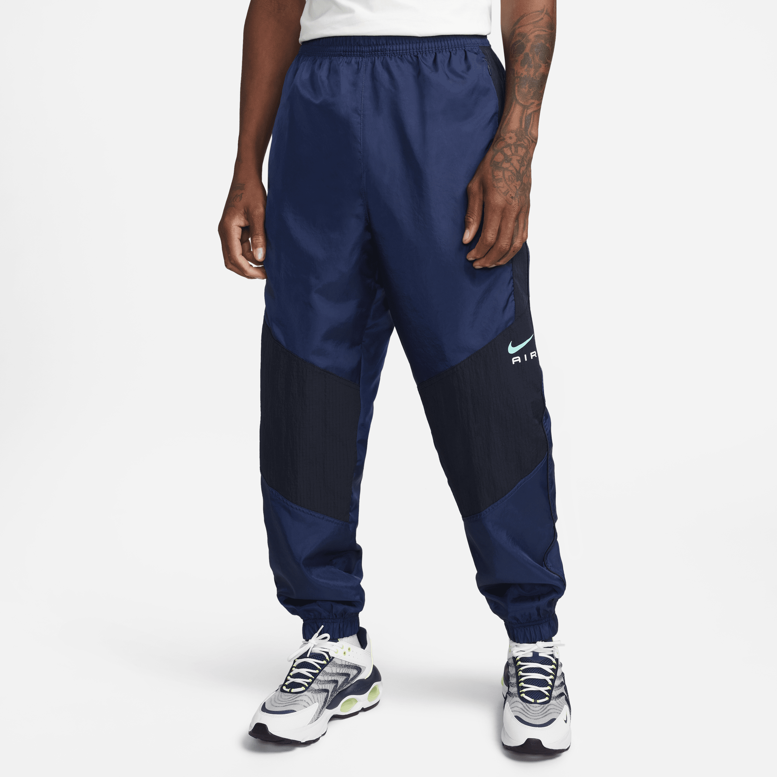 Vævede Nike Air-bukser til mænd - blå