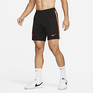 men red nike shorts