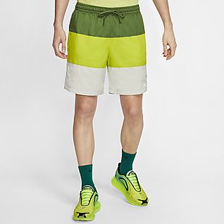 nike essentials shorts in yellow