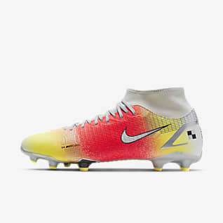 grey and yellow nike boots