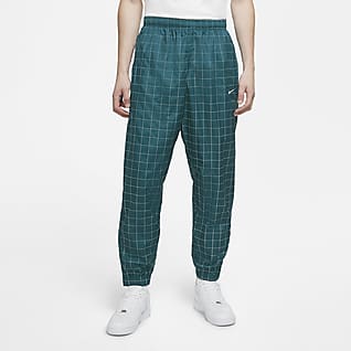 nike woven plaid track pants