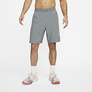 Nike Dri-FIT Pantalons curts de teixit Woven estampats de 23 cm de fitnes - Home