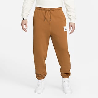 Jordan Essentials Pantalones de tejido Fleece para hombre Statement