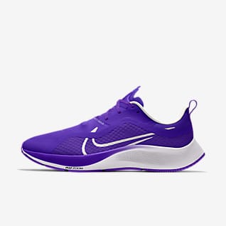 white and purple nike shoes