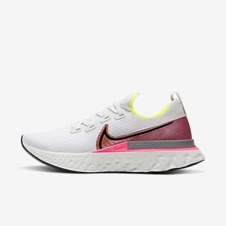 nike track spikes pink and yellow
