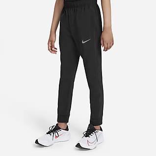 Nike Dri-FIT Spodnie treningowe z tkaniny dla dużych dzieci (chłopców)