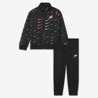 Nike junior tracksuit sale best sale