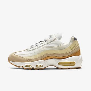 ladies black and gold nike trainers