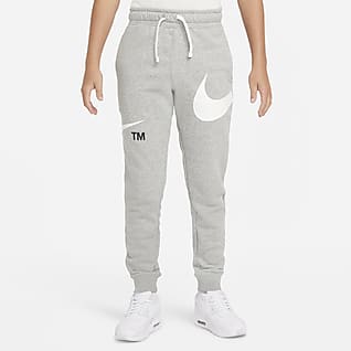 Nike Sportswear Swoosh Flísové kalhoty pro větší děti (chlapce)