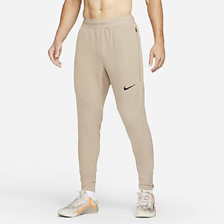Nike Pantalones de entrenamiento para hombre de tejido Woven para invierno