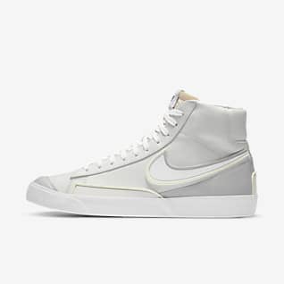 white nike mid top shoes