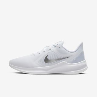 white and gray nike running shoes