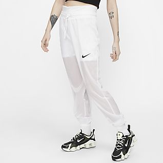 Женщины Белый Брюки и тайтсы. Nike RU