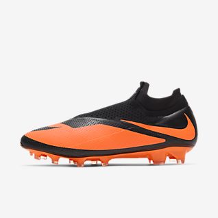 botas de futbol nike negras y naranjas