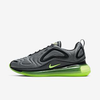 black nike shoes with green tick