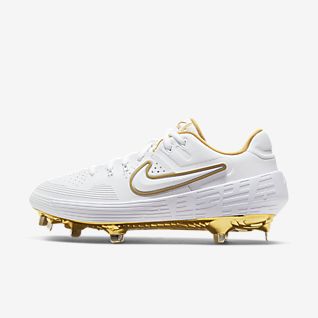 white and gold nike cleats
