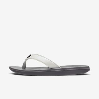 white two strap nike sandals