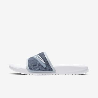 nike slippers blue and white