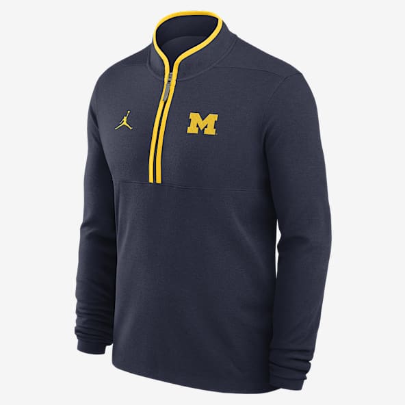 Michigan Victory Michigan Victory Playera de manga larga universitaria marca Jordan Dri-FIT de medio cierre para hombre