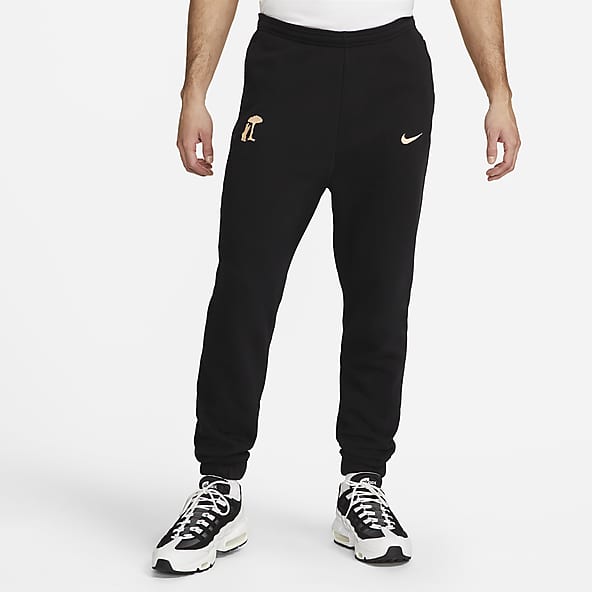 George Bernard write Ninth Pantaloni sportivi e joggers da uomo. Nike IT