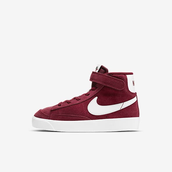 girls red nike trainers