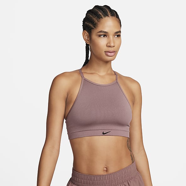 Purple Nike Indy Pullover Sports Bras.