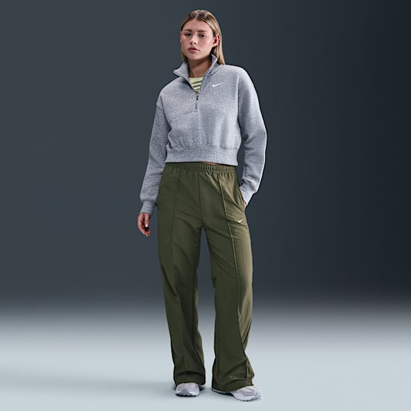 Nike Sportswear Everything Wovens Pants de tiro medio con dobladillo abierto para mujer