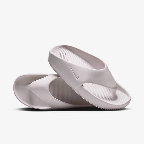 Womens purple nike slides hot sale