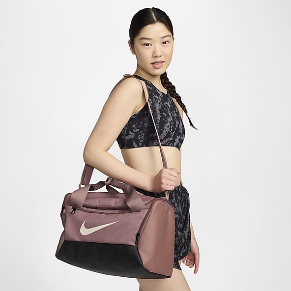 Morado Lifestyle Bolsas de deporte. Nike ES