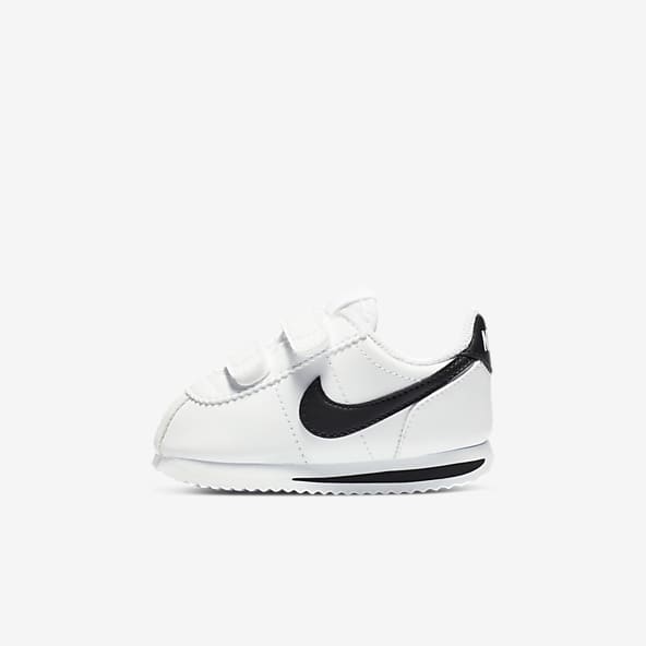 black and white nike shoes with strap