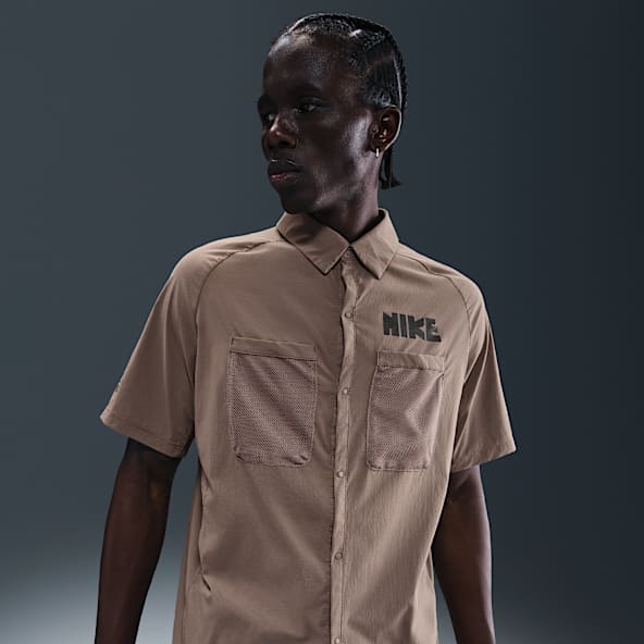 Nike Parte de arriba de running Dri-FIT UV de manga corta con botones - Hombre